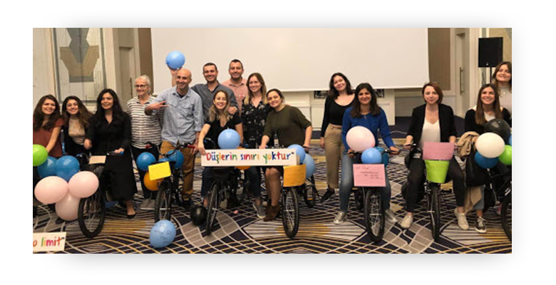 Colgate employees volunteers repairing bicycles for the Koruncuk Foundation